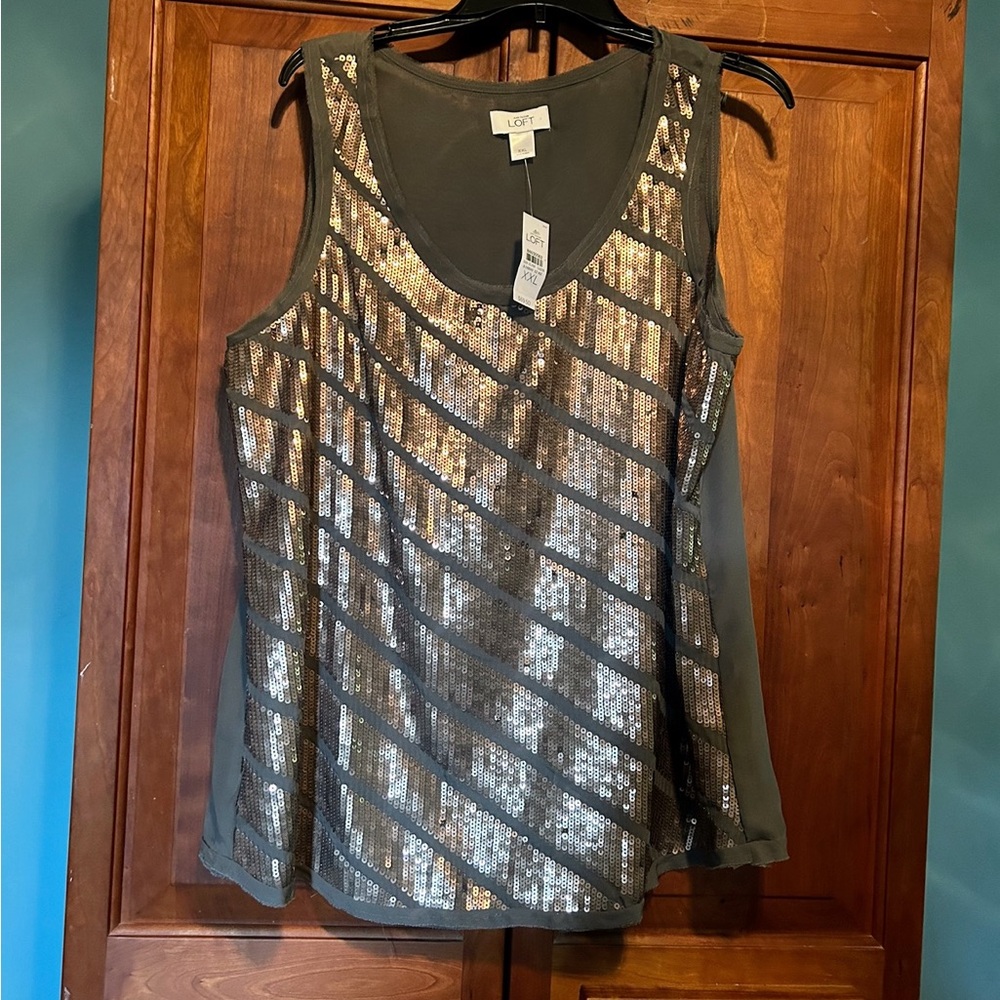 Sleeveless top… Army green and gold…